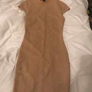 Nude studded bodycon dress